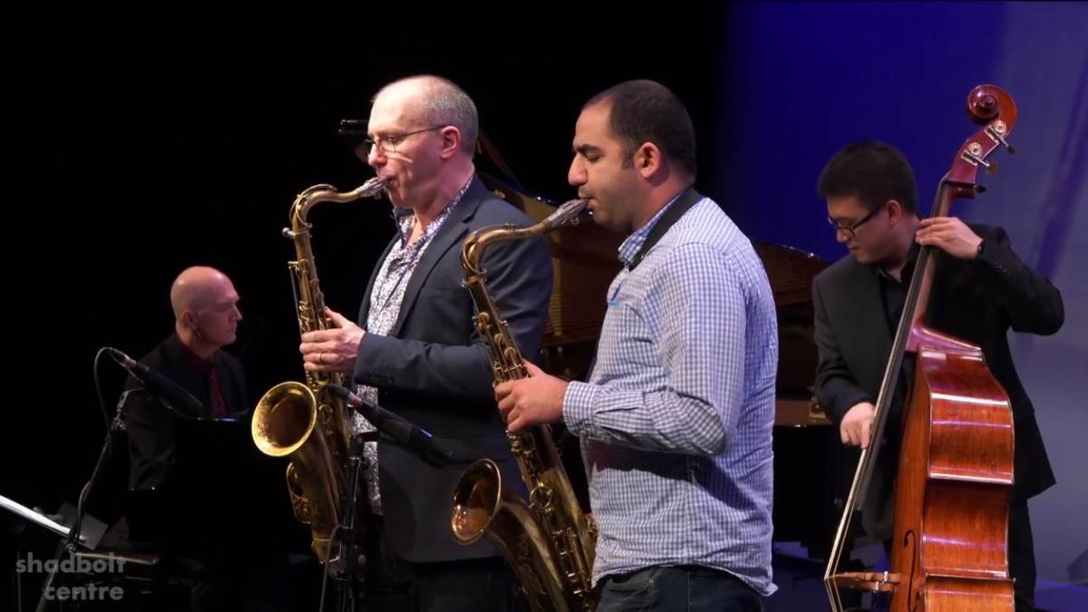 Miles Black on piano, Steve Kaldestad and Ardeshir Pourkeramati on tenor saxophones, and John Lee on bass.