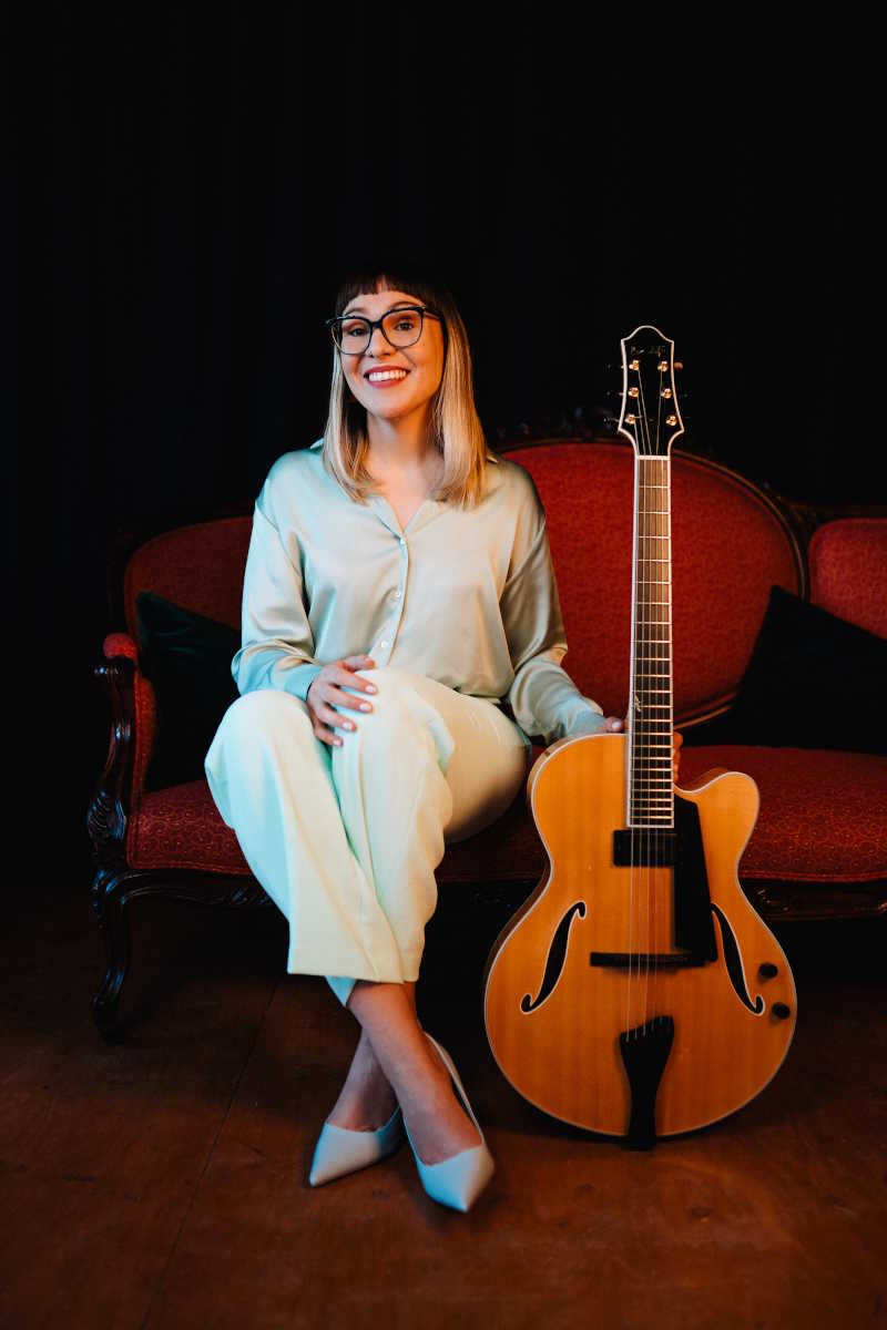 Jocelyn Gould photo with guitar